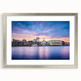 Textured abstract art print of Savannah scenery in muted earth tones, framed in silver, ideal for bedroom art.