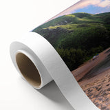 Art Deco poster depicting the scenic Kauai landscape in muted green and blue tones on rolled canvas.