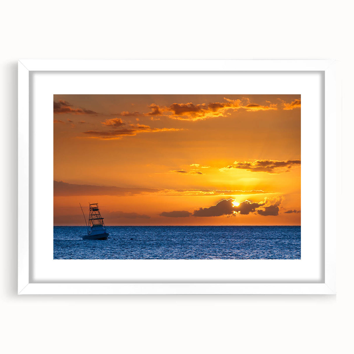 Abstract art print of Maui scenery in muted blue and green tones, framed with a white mat.