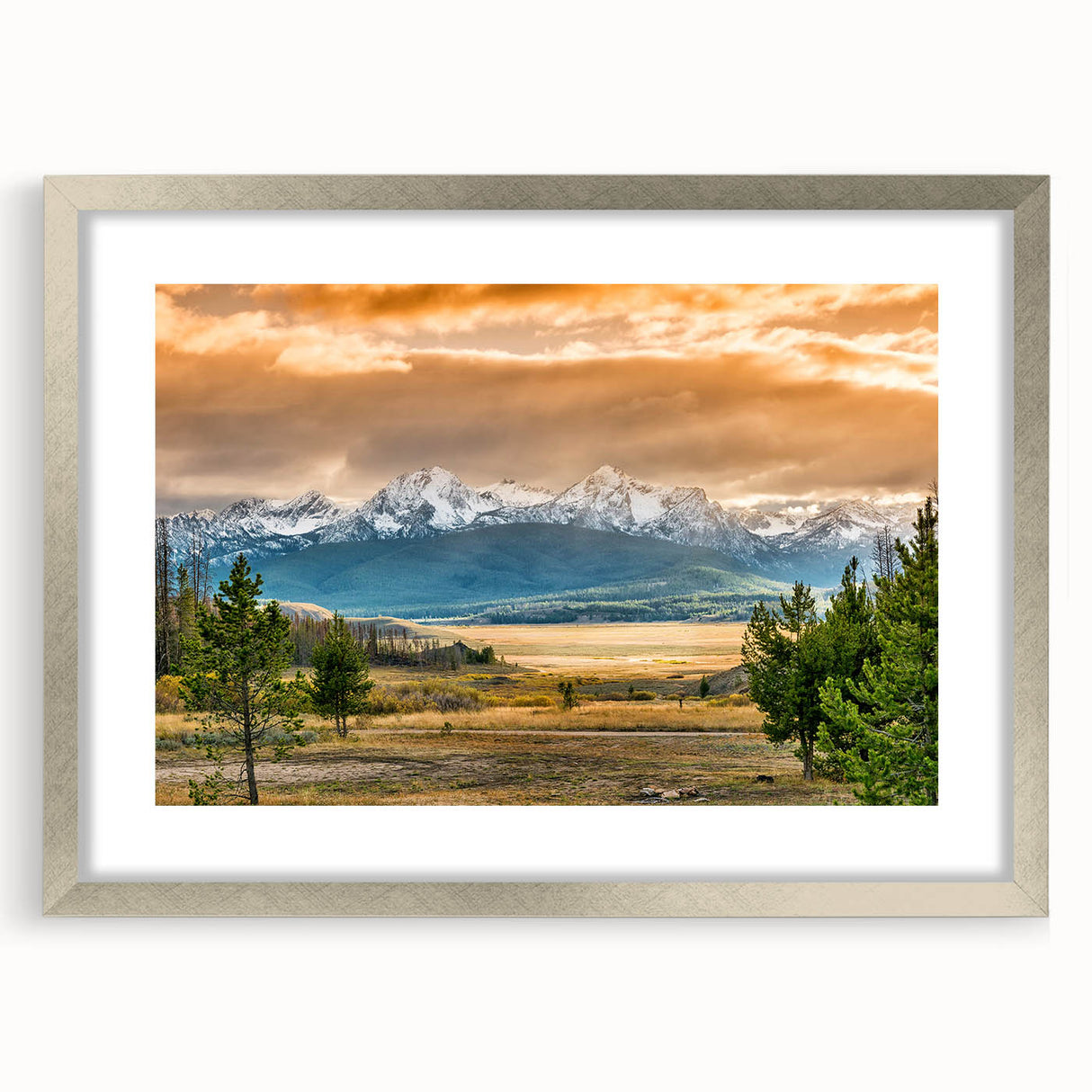 Textured abstract art print of Idaho scenery in muted earth tones, framed in silver, ideal for bedroom wall decor.