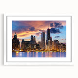 Abstract art print of Chicago skyline in muted gray and blue tones on a framed white mat, ideal for dining room decor.
