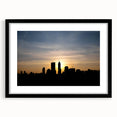 Abstract art print of Indianapolis skyline in vibrant colors on a large, framed canvas, ideal for living room decor.