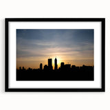 Abstract art print of Indianapolis skyline in vibrant colors on a large, framed canvas, ideal for living room decor.