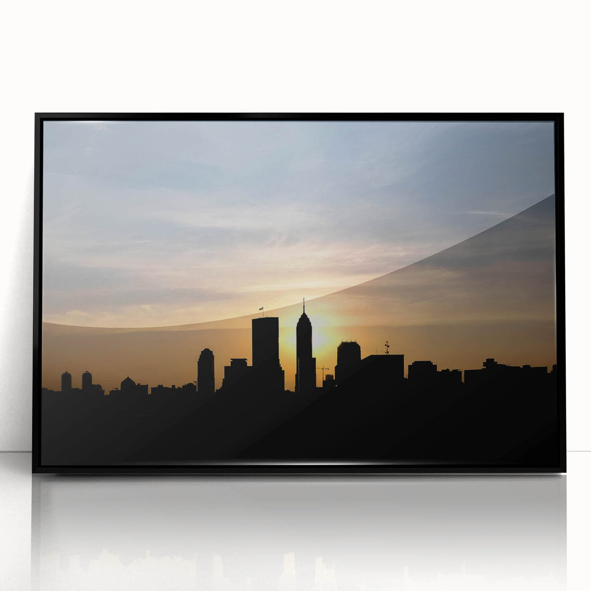 Large abstract wall art depicting the Indianapolis skyline in muted black and gray tones on a framed acrylic print.