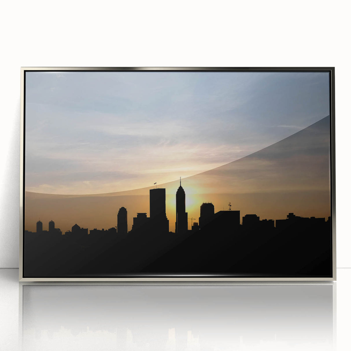 Mid-century modernist art depicting the Indianapolis skyline in muted blue tones on a framed acrylic panel.