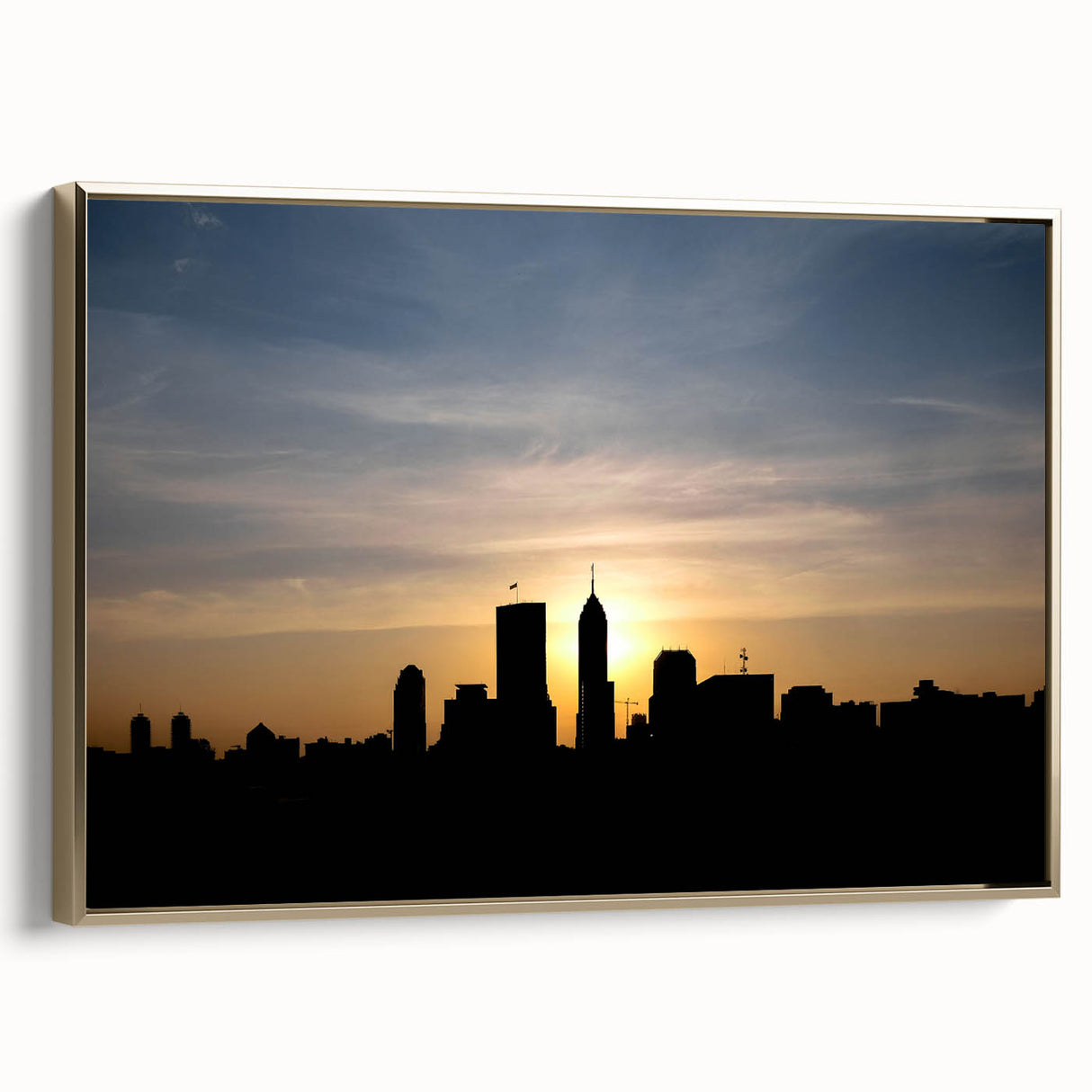 Framed canvas depicting Indianapolis skyline in muted gold and black tones, suitable as wall art for bedroom.