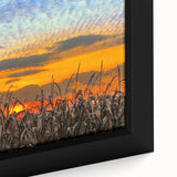 Close-up of a textured black wall art depicting Indiana scenery in vibrant colors on a framed canvas.