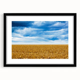 Extra large abstract art print of Iowa scenery in vibrant colors on a black framed canvas, ideal for living room decor.