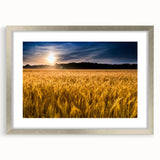 Textured abstract art print of a Kansas scenery in muted earth tones, framed in silver, ideal for bedroom art.