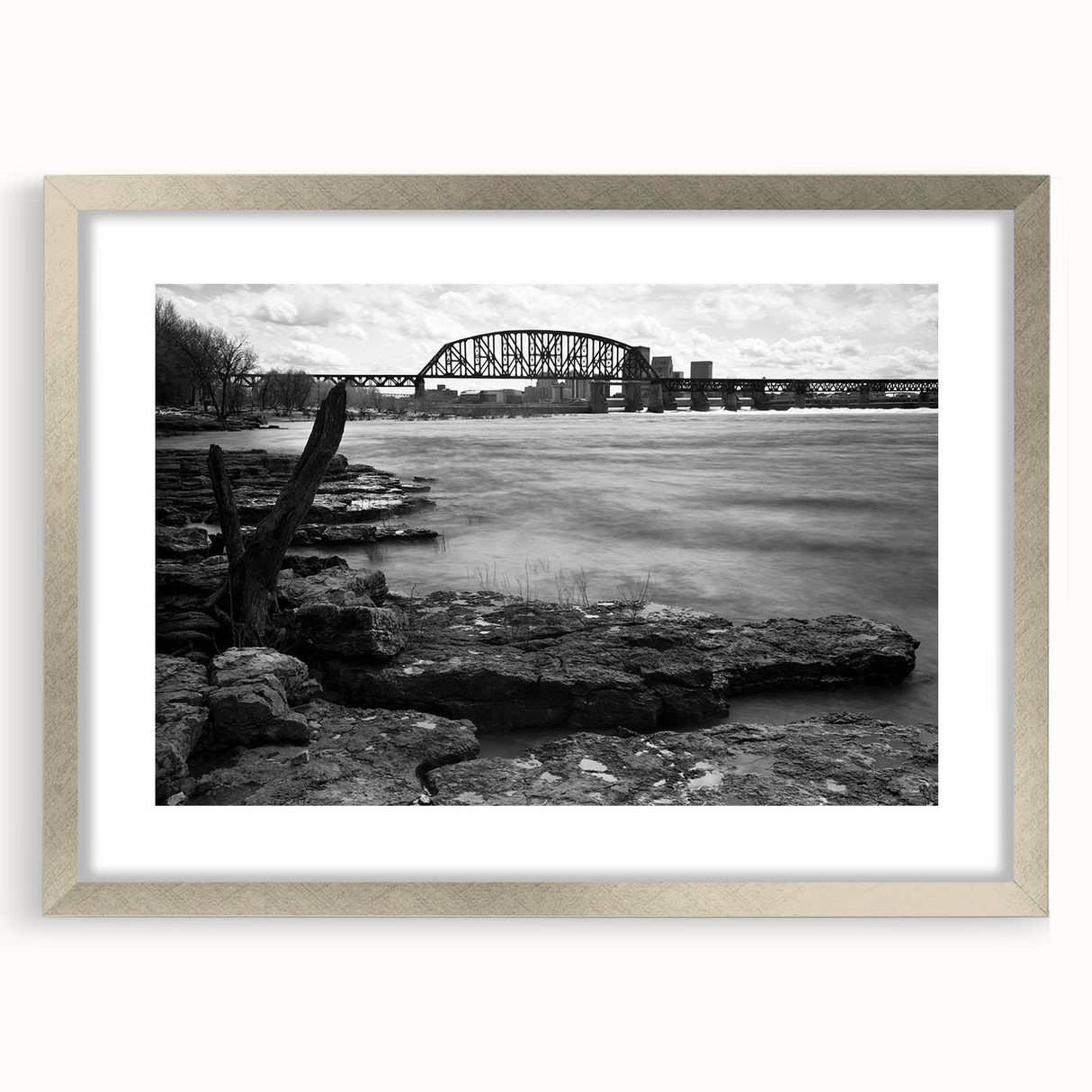 Textured art print of an abstract Kentucky landscape in muted earth tones, framed in silver, suitable for bedroom decor.