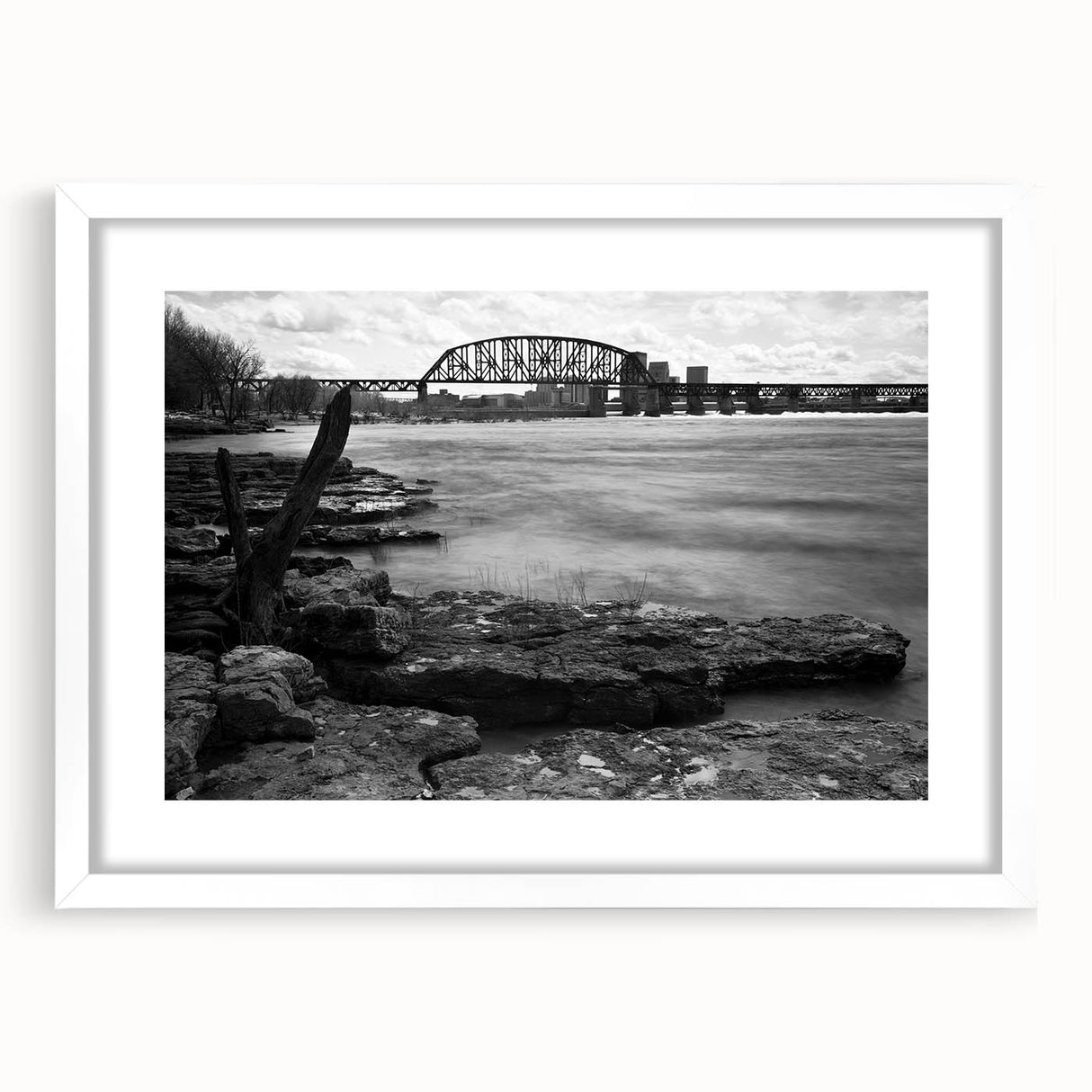 Abstract art print of Kentucky landscape in muted green and blue tones, framed in white, ideal for dining room decor.