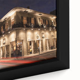 Extra large framed canvas of a textured New Orleans scene in black with colorful accents, ideal for living room decor.
