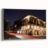 Framed canvas of a vintage-style New Orleans landscape, featuring colorful art on a black background.