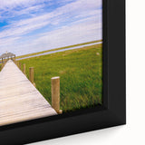 Extra large framed canvas depicting a textured Louisiana landscape in black with colorful accents.