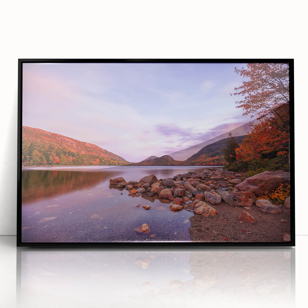 Large abstract wall art depicting Acadia's rugged coastline in muted earth tones, framed in black acrylic.