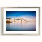 Textured abstract art print of Baltimore skyline in muted gray tones on a framed canvas, suitable for bedroom decor.
