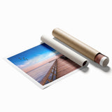 Rolled print of Chesapeake Bay with soft blue and green hues, ideal for classy bathroom wall art.