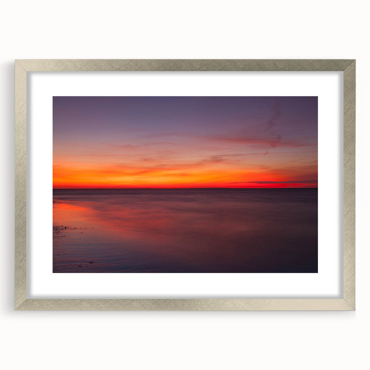 Textured abstract art print of Massachusetts Cape in a silver frame, featuring muted blue and gray tones.