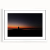 Abstract art print of Nantucket scenery in muted blue and white tones, framed in white, suitable for dining room decor.