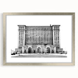 Textured abstract art print of Detroit skyline in muted gray and blue tones, framed with a silver mat.