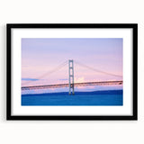 Colorful abstract art print of Michigan's Upper Peninsula in vibrant hues on a large textured canvas, framed in black.