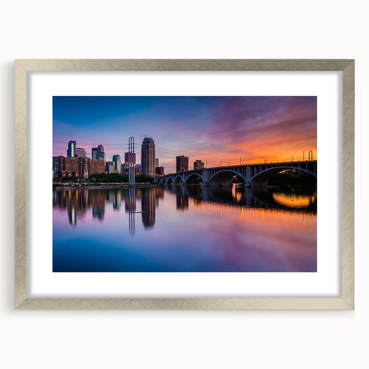 Textured abstract art print of Minneapolis skyline in muted gray tones on a framed canvas, ideal for modern bedroom ambiance.