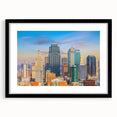 Abstract art print of Kansas City with vibrant, colorful textures on a large framed canvas, ideal for living room decor.