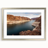Textured art of Hoover Dam in abstract style with muted earth tones on a silver-framed mat, ideal for bedroom art.