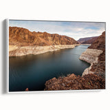 Vintage poster art of Hoover Dam in colorful hues on a large framed canvas, ideal for living room decor.