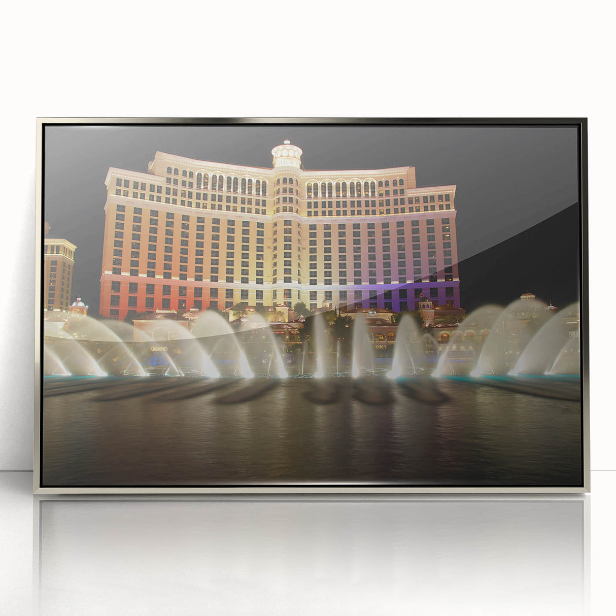 Mid-century modernist art of Las Vegas skyline in silver framed acrylic, featuring pastel shades.