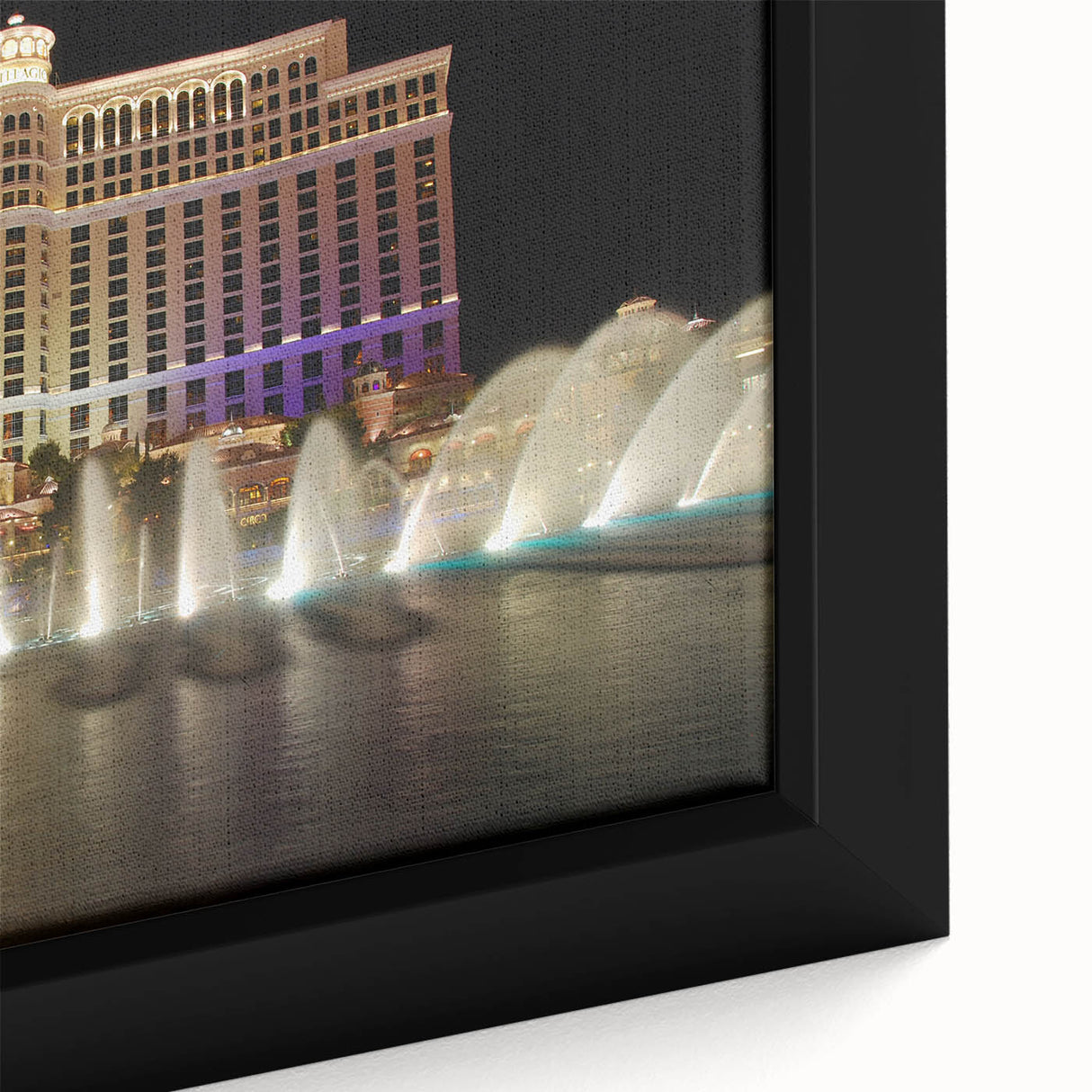 Extra large framed canvas of Las Vegas scenery in textured black with colorful accents, ideal for living room decor.