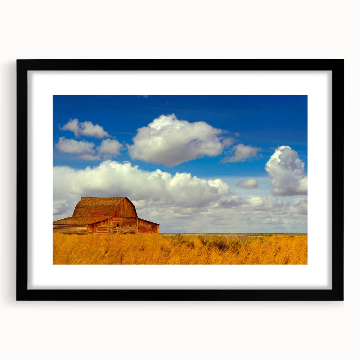 Abstract art print of a textured, colorful New Mexico landscape on a large framed canvas.