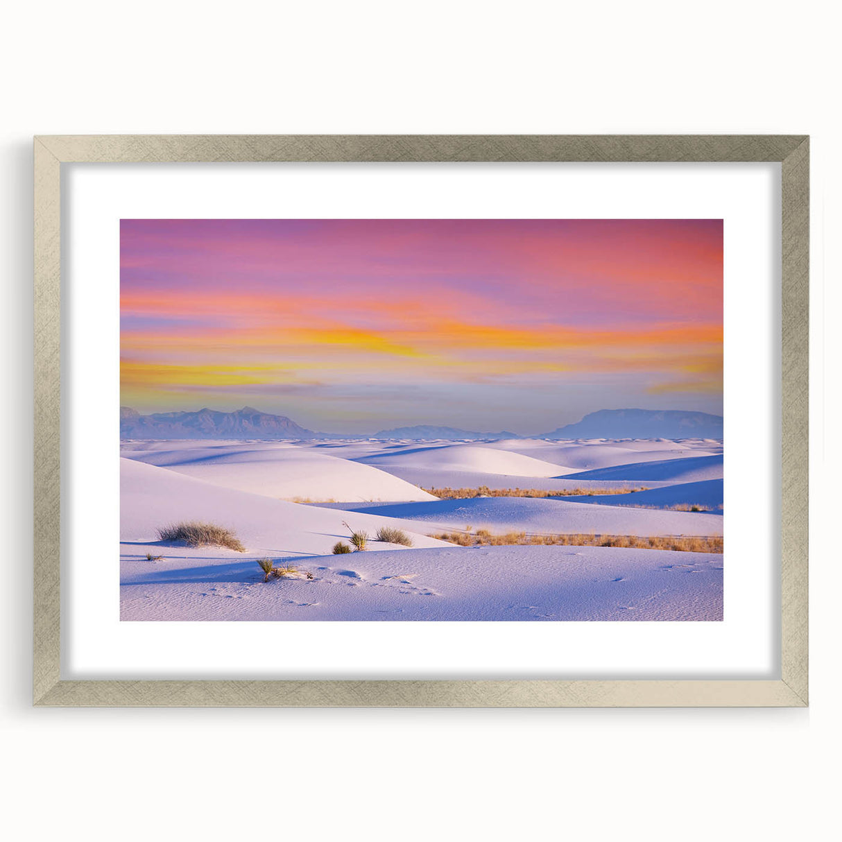 Textured art of abstract white sands in muted beige, framed in silver, ideal for bedroom art.