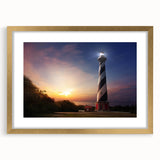Abstract art print of Cape Hatteras with textured brush strokes in muted earth tones, framed in gold.