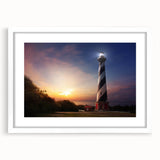 Abstract art print of Cape Hatteras in muted gray and blue tones on a framed white mat, ideal for dining room decor.