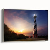 Framed canvas of Cape Hatteras landscape with vintage poster style in a silver frame, featuring a black and colorful palette.
