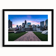 Extra large abstract art print of colorful, textured Charlotte skyline on black framed canvas, ideal for living room decor.
