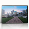 Large abstract wall art depicting the Charlotte skyline in muted gray and blue tones on a framed acrylic.