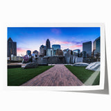 Rolled print of Charlotte, North Carolina skyline in muted blues and greens, ideal for art wall dining room decor.