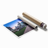 Rolled print of Charlotte, North Carolina skyline in muted blue tones, ideal for classy bathroom wall art.
