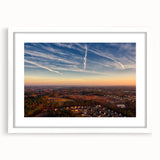 Abstract art print of Durham, North Carolina in muted gray and blue tones, framed with a white mat.