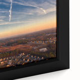 Textured black wall art depicting a colorful Durham, North Carolina cityscape on a framed canvas.