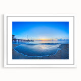 Abstract art print of North Carolina's Outer Banks in muted blue tones, framed with a white mat.