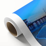 Art deco poster of Outer Banks, North Carolina on rolled canvas, featuring muted blue and beige tones.