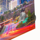 Large abstract wall art of Raleigh skyline in muted blue and green tones on acrylic glass, ideal for dining room ambiance.