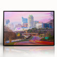 Large abstract wall art featuring Raleigh, NC skyline in muted gray, framed in black acrylic.