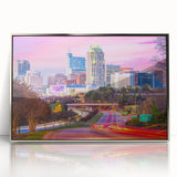 Mid-century modernist art of Raleigh skyline in muted colors on framed acrylic, ideal for nursery wall art.