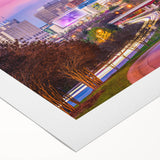 Art deco poster of Raleigh skyline in muted blue tones on rolled canvas, suitable for dining room wall art.