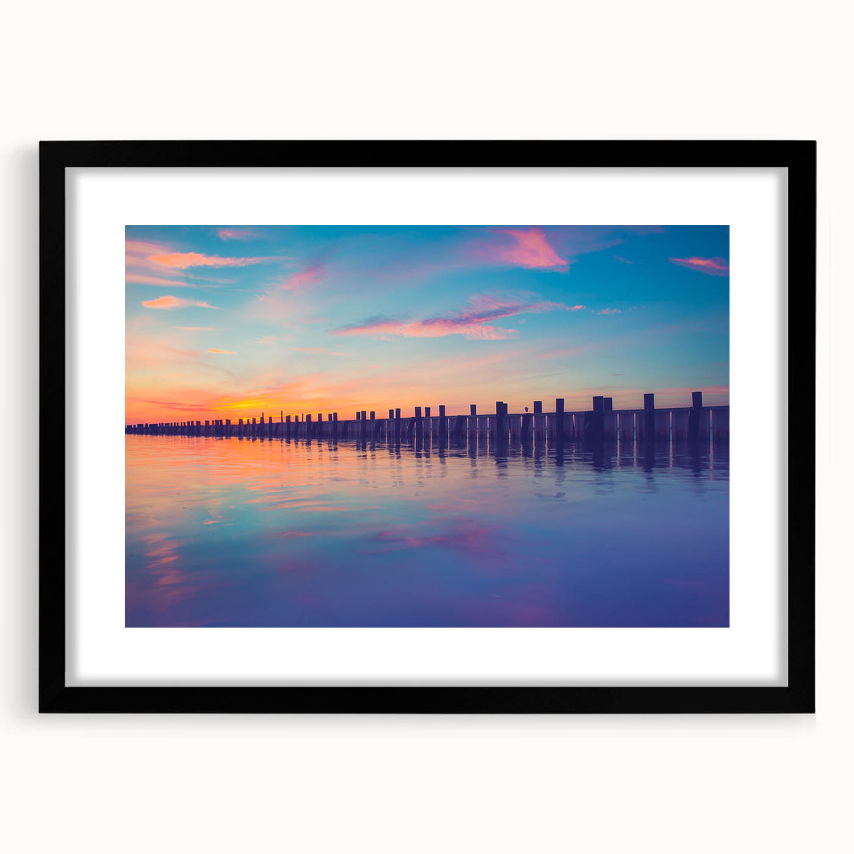 Extra large abstract art print of colorful, textured scenery on black framed canvas, ideal for living room decor.