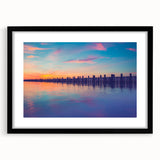 Extra large abstract art print of colorful, textured scenery on black framed canvas, ideal for living room decor.